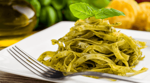 pesto sauce on top of noodles