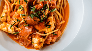 marinara sauce on a pasta dish